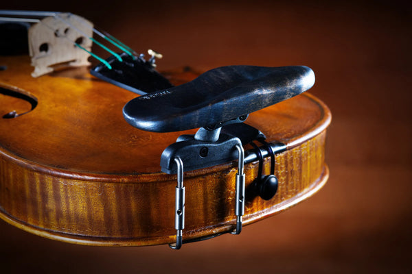Showing the side mount charred kréddle custom violin chin rest.