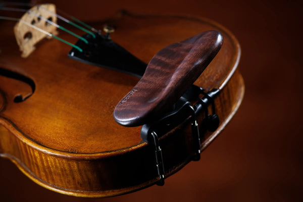 Showing the side mount rose kréddle custom violin chin rest from the side.