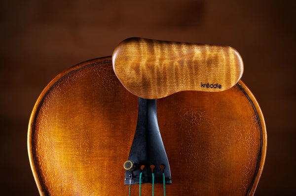 Kréddle custom violin chin rest in golden maple.