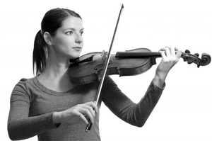 Showing the act of rotating the chin plate of the kréddle, which swings the scroll of the instrument left to right.